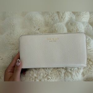 Kate Spade Cream Wallet with Textured Finish and Gold Accents